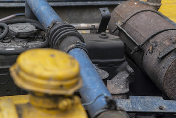 old engine machine of a backhoe