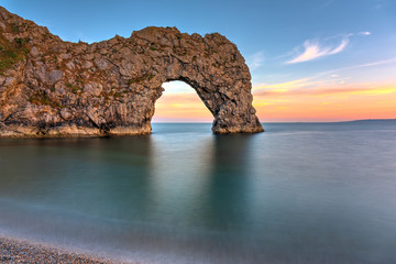 Fototapeta na wymiar The Durdle Door, part of the Jurassic Coast in southern England, after sunset