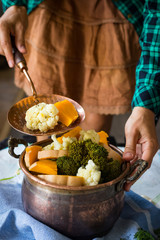 Steamed, cooked, boiled vegetables. Vegan, vegetarian healthy food concept