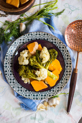 Steamed, cooked, boiled vegetables. Vegan, vegetarian healthy food concept