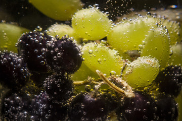 grapes in water splash