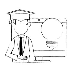 student graduated with computer and bulb