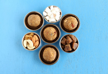 Coconut laddu, an Indian, traditional, popular, and delicious sweet dish and its ingredients, is made on festival days like Ganesh Chaturthi, Dussehra and Diwali.