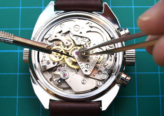 watchmaker working repairing watch