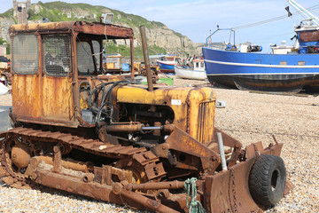 Hastings beach bulldozer for fishing boat launch