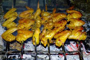 roasted chicken on charcoal outdoor