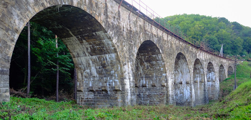 Fototapeta na wymiar stone railway bridge