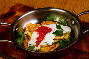 Potato pancake with caviar