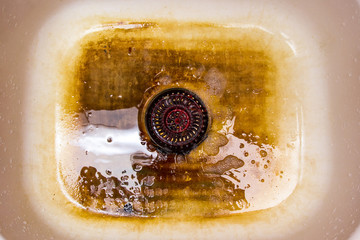 A rusty old sink in the kitchen