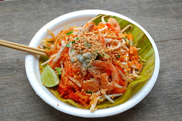 Traditional food in the floating market in Amphawa near Bangkok in Thailand