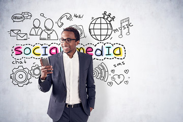 Cheerful African American man, phone, social media