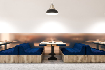 Blue sofa cafe interior, marble floor side view