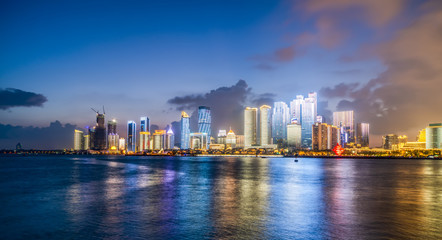 Fototapeta na wymiar Night view of modern urban architecture landscape in Qingdao..