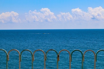 Sea behind the fence