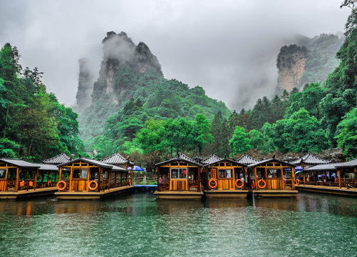 Baofeng Lake Boat Trip in a rainy day with clouds and mist at Wulingyuan, Zhangjiajie National Forest Park, Hunan Province, China, Asia