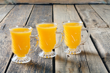 Healthy pumpkin fruit smoothie on  wooden table
