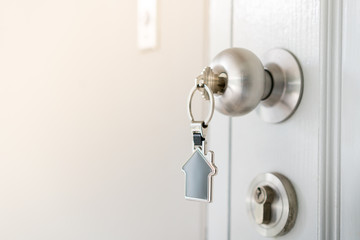Home and housing estate concept, a key to open the door