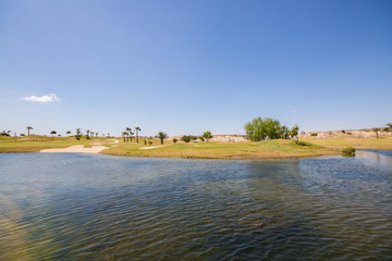 Large lake, sandpits and golf course on the Costa Blanca in Spain on a summer day