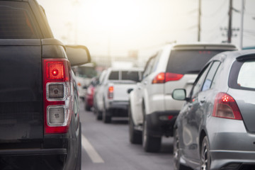 Fototapeta premium Cars break on the road for safety in traffic junction there are many cars on the road. and head to travel or do business.