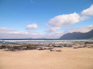 Beach and mountains - beautiful coast in Caleta de Famara, Lanzarote Canary Islands.