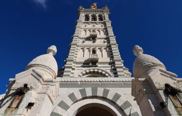 The scenic stone bell tower of Notre Dame de la Garde Basilica, Marseille, France.