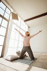 Fototapeta premium Cheerful nice woman resting at home