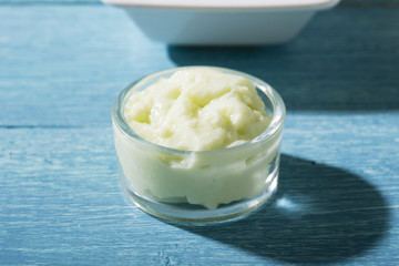 beauty product samples from grape seed ingredient, blue wooden table background