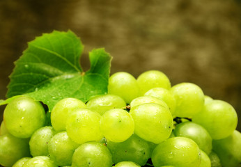 Grapes fruit with leaf like autumn  background 