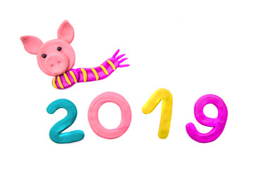 New year plasticine number 2019 with the symbol of the year - pig