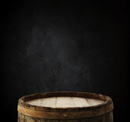 Fototapeta premium background of barrel and worn old table of wood