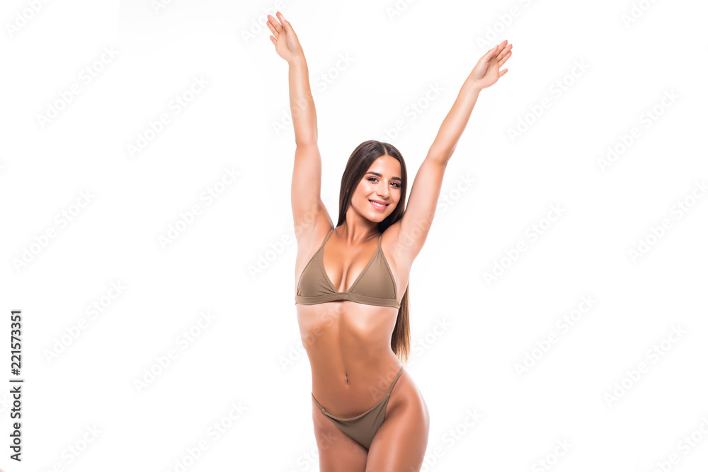 Wall mural Gorgeous sexy woman in bikini with perfect body isolated over a white background