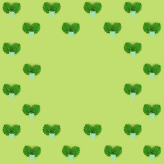 Tropical palm monstera leaves lies in a pastel pails on a colored background. Flat lay trendy...