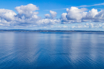 Obraz premium Galway bay with clouds reflection