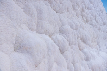 Natural travertine Pamukkale natural calcium carbide stone  wall. Cotton castle in southwestern Turkey