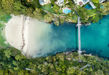 Pedestrian walking bridge over the long narrow bay