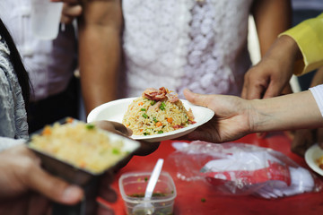 Helping the poor in society by donating food : The concept of hunger