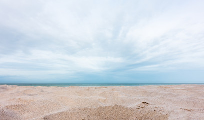 Fototapeta na wymiar View of beautiful beach sand and sky background