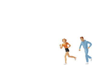 Fototapeta na wymiar Miniature people : Couple running on white background