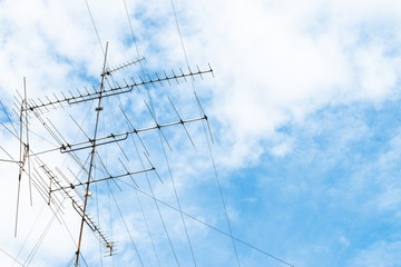 television antenna with blue sky