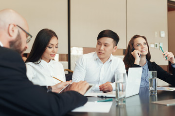 Business people working together at conference table
