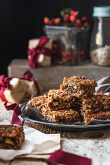 Flapjack of oats, pumpkin seeds, sunflower seeds and dried fruit, in gift packets for Christmas 