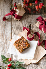 Flapjack of oats, pumpkin seeds, sunflower seeds and dried fruit, in gift packets for Christmas 