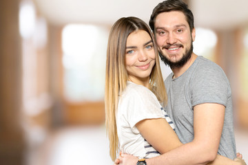 Obraz na płótnie Canvas Happy Smiling Couple in love indoors portrait