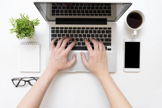 Man Is Typing On Laptop Keyboard, Top View.