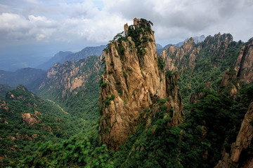 Huangshan China National Park - Anhui Province, Chinese Mountain Peak. Viewing Platform, Yellow Granite Mountains with Canyon, Exotic Pine Trees and Forest, Jagged Cliffs, UNESCO World Heritage Site