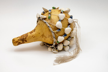 African gourd maraca rattle isolated on a white background