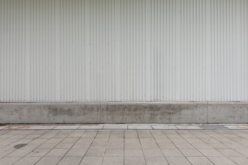 street wall background ,Industrial background, empty grunge urban street with warehouse brick wall