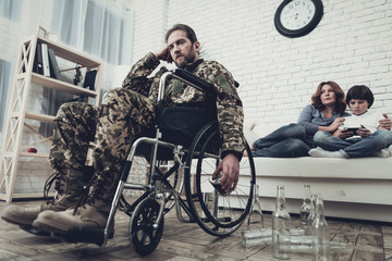 A Veteran Sits In A Wheelchair. Alcohol Problem.