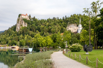 Walkway on Lake Bled, the most beautiful place to spend holidays in Slovenia and Julian Alps. 