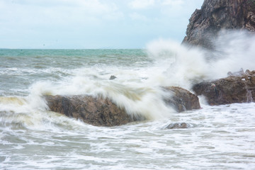 sea waves hit the rocks